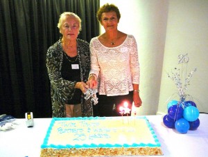 Joy & Maureen cutting the cake